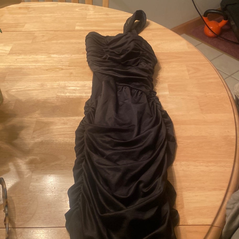 Bebe black dress with zipper on the side